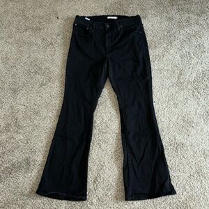 Levi’s black flare jeans. Size: W33 L32
